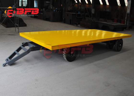 Forklift Towing Flatbed Steel Coil Trailers On Cement Floor