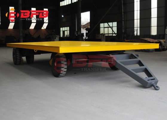 Forklift Towing Flatbed Steel Coil Trailers On Cement Floor