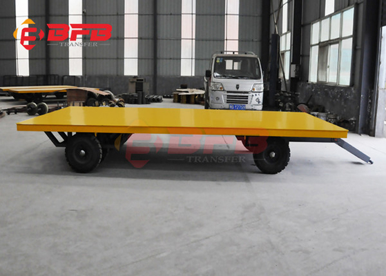 Forklift Towing Flatbed Steel Coil Trailers On Cement Floor